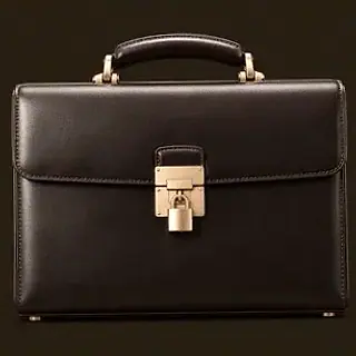 Locked leather briefcase — Vegas Nova Casino